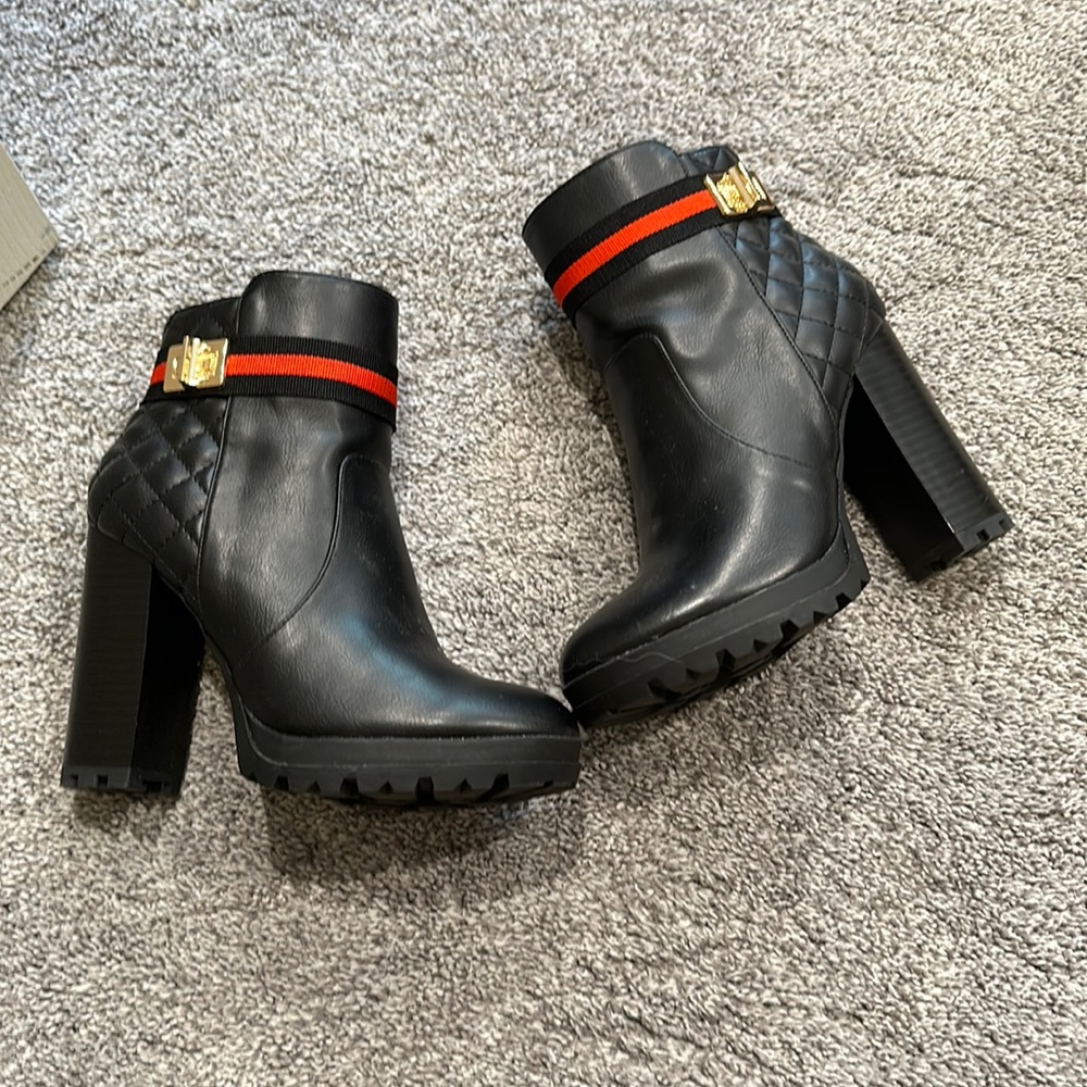Black square heel boots.